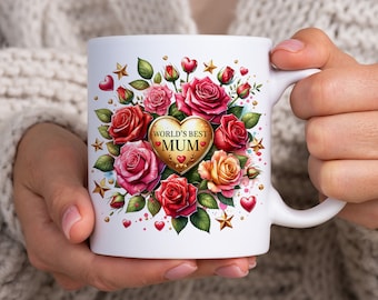 May include: White ceramic mug with a gold heart design featuring the text "World's Best Mum". The heart is surrounded by red, pink, and yellow roses with green leaves and gold stars.