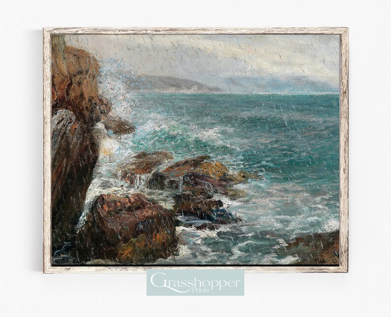 May include: A framed painting depicting a stormy seascape with crashing waves and a rocky coastline. The sky is overcast and rain is falling. The painting is done in a realistic style with a muted color palette.