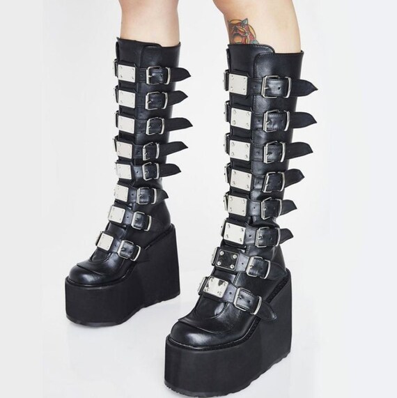 black boots silver buckles
