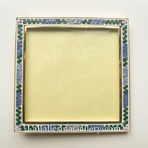 May include: Square picture frame with a gold border and a mosaic floral design in blue, green, and white. The frame has a light yellow interior. The text "LaBallerinaGallery.com" is at the bottom.