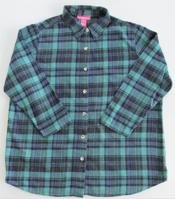 woman within flannel shirts