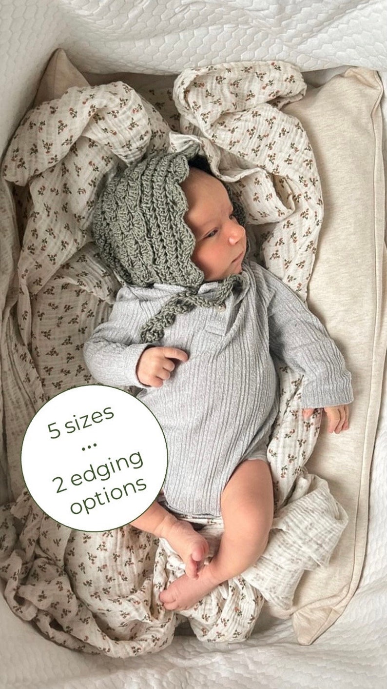 May include: A baby wearing a sage green crocheted bonnet with a scalloped edge, a gray ribbed onesie, and a white muslin swaddle with a brown floral print. The text "5 sizes... 2 edging options" is visible in the image.