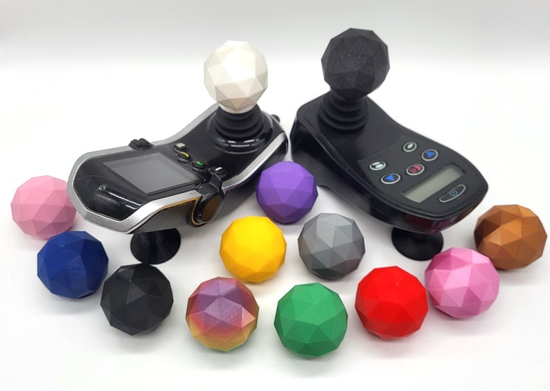 May include: A set of 12 colourful, geometric joystick balls for gaming controllers. The balls are made of a durable plastic and come in a variety of colours, including pink, purple, blue, green, yellow, and black. The balls are designed to fit most standard joystick controllers.