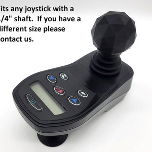 May include: Black joystick with a diamond-shaped knob and a digital display. It has multiple buttons and fits any joystick with a 1/4 inch shaft. "Fits any joystick with a 1/4" shaft. If you have a different size please contact us."