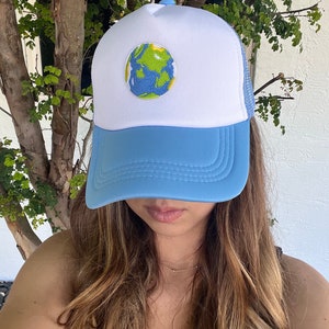 around the world trucker hat