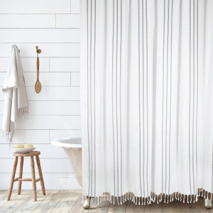 Vertical Stripe Shower Curtain in White with Black Stripes and Tassles by Hall & Perry