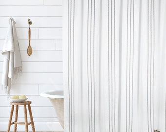 Vertical Stripe Shower Curtain in White with Black Stripes and Tassles by Hall & Perry