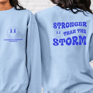 Osteogenesis Imperfecta Awareness Sweatshirt for OI Warrior Awareness Tee Brittle Bone Disease Shirt Gift for Lobstein Syndrome Rare Disease