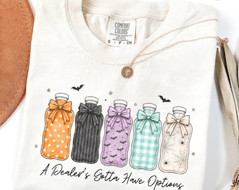 T-shirt d'infirmière scolaire pour Halloween, T-shirt vendeur de poches de glace, T-shirt humoristique pour étudiante en soins infirmiers, Cadeau pour la saison des frissons, T-shirt pour travailleur médical aux couleurs confortables de l'automne, T-shirt sorcière