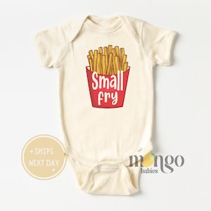 May include: A cream-colored baby onesie with a red and yellow cartoon image of a french fry container with the text "Small Fry".
