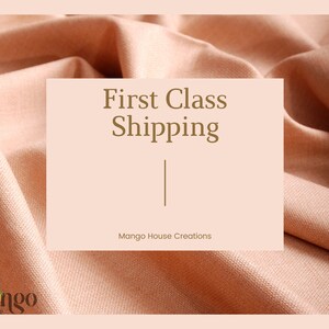 May include: A peach-colored fabric background with the text "First Class Shipping" in a serif font. The text is centered within a light peach rectangle. The words "Mango House Creations" are below the text.