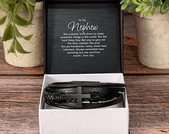 May include: A black gift box with a black leather bracelet with a cross charm. The box has a message inside that reads "To My Nephew, Your parents have done so many awesome things in this world. But the best thing they did was to give me the best nephew like you! You are handsome, funny, smart and talented. Always remember how amazing you are and how much I love you."