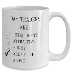 May include: White ceramic mug with black text that reads "Day Traders Are: Intelligent, Attractive, Funny, All of the Above". A checkmark is next to the last option.