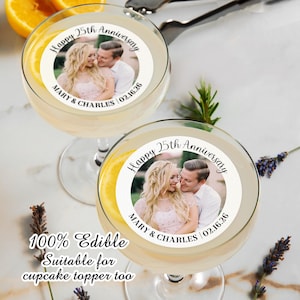 May include: Two edible cupcake toppers with a photo of a couple and the text "Happy 25th Anniversary Mary & Charles 02.16.26".