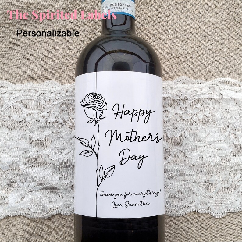 May include: A white wine bottle label with a black line drawing of a rose and the text "Happy Mother's Day". The text "Thank you for everything! Love, Samantha" is also included.