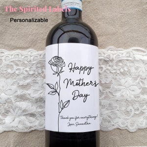 May include: A white wine bottle label with a black line drawing of a rose and the text "Happy Mother's Day". The text "Thank you for everything! Love, Samantha" is also included.
