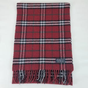 Genuine Burberry wool scarf in good used condition beige colour  size Length 72 inches