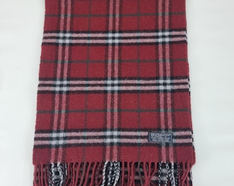 Genuine Burberry wool scarf in good used condition beige colour  size Length 72 inches