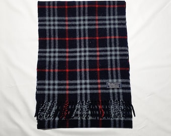 Genuine Burberry wool scarf in good used condition size Length 65 inches