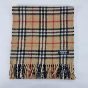 Genuine Burberry Cashmere scarf in good used condition beige colour  size Length 56 inches