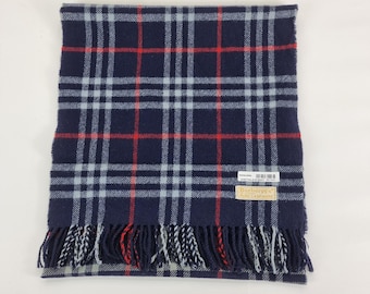 Used Genuine Burberry Cashmere scarf in a good condition size 56 inches