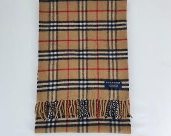 Genuine Burberry wool scarf in an excellent condition size Length 171cm Made is England