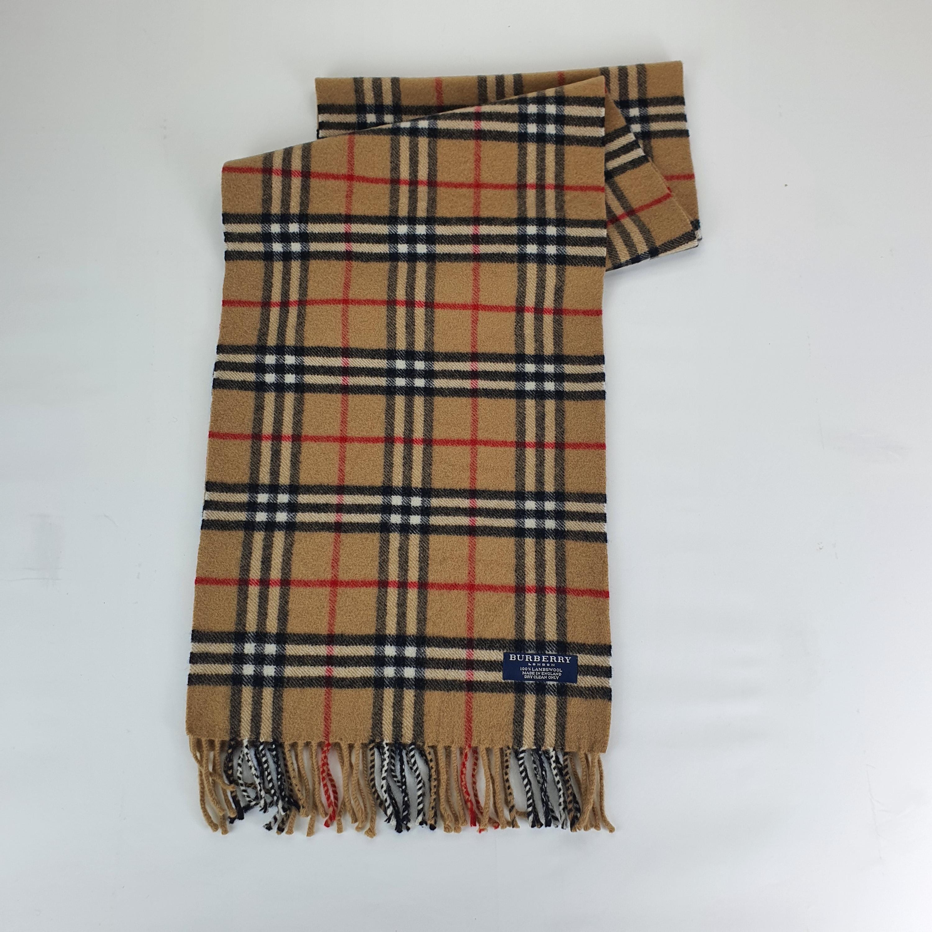 Genuine Burberry wool scarf in an excellent condition Beige colour  size Length 170cm