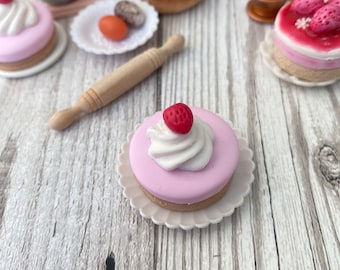 Miniature Strawberry topped cheesecake