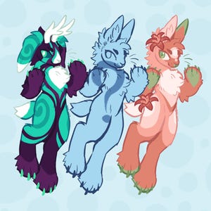 May include: Three cartoon bunnies in a whimsical style. One is teal and purple with antlers, the second is light blue, and the third is pink and green with flowers. They are all in a playful pose against a light blue background.