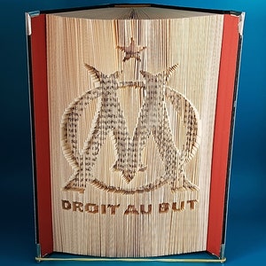 Logo O.M.