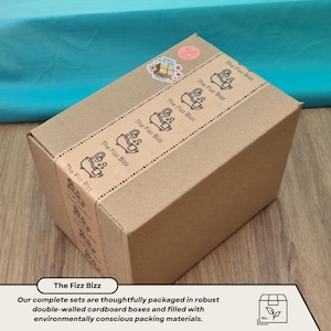 Our complete sets are thoughtfully packaged in robust double walled cardboard boxes and filled with environmentally conscious packing materials. Brown outer box with Fizz Bizz branded packing tape and a handle with care sticker.