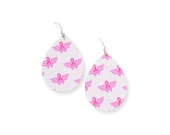 May include: A pair of white teardrop-shaped earrings with a pink ribbon and wings pattern.