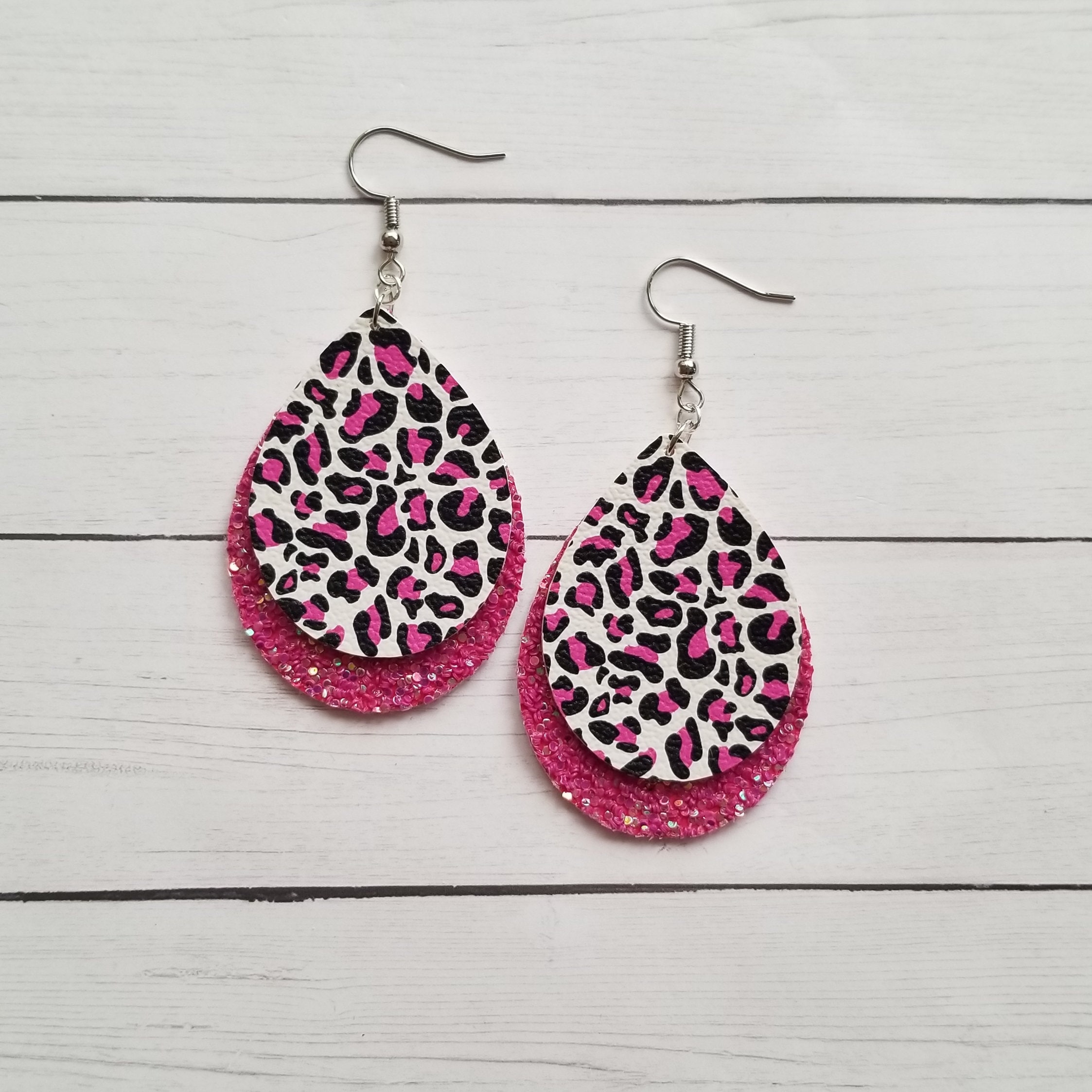 Pink leopard print earrings deals