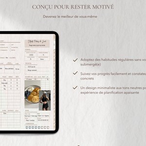 May include: A digital fitness planner displayed on a tablet. The planner features sections for daily goals, exercise tracking, and meal planning. The text "CON&Ccedil;U POUR RESTER MOTIV&Eacute;" is at the top, with additional text in French. The planner has a minimalist design.