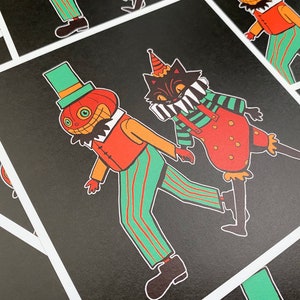 May include: A black and white illustration of a pumpkin and a cat dressed as clowns. The pumpkin is wearing a green hat and a red and white striped shirt. The cat is wearing a red and white striped shirt and a red and white striped hat. The background is black.