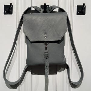 Small women&#39;s backpack made of genuine beige leather
