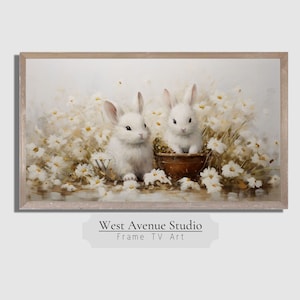 May include: Two white bunnies sitting in a basket surrounded by white flowers. The bunnies are looking at the viewer. The background is a light blue.
