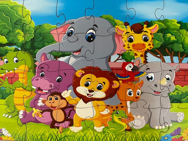 May include: A colorful cartoon puzzle featuring a group of animals including a purple hippopotamus, a green crocodile, a gray elephant, a yellow giraffe, a red parrot, a brown lion, a brown monkey, a brown and orange deer, and a gray rhinoceros. The animals are standing on a green grassy field with flowers and a red brick wall in the background.