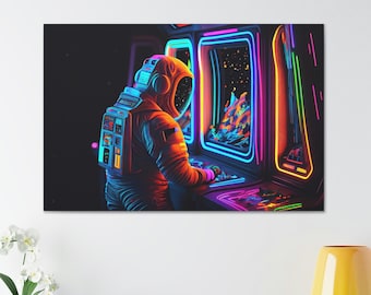 May include: A vibrant canvas print depicts an astronaut playing a retro arcade game. The astronaut is clad in an orange spacesuit, illuminated by the neon glow of the game's screen. The game features a colorful, cosmic scene, with bright pink, blue, and yellow accents.