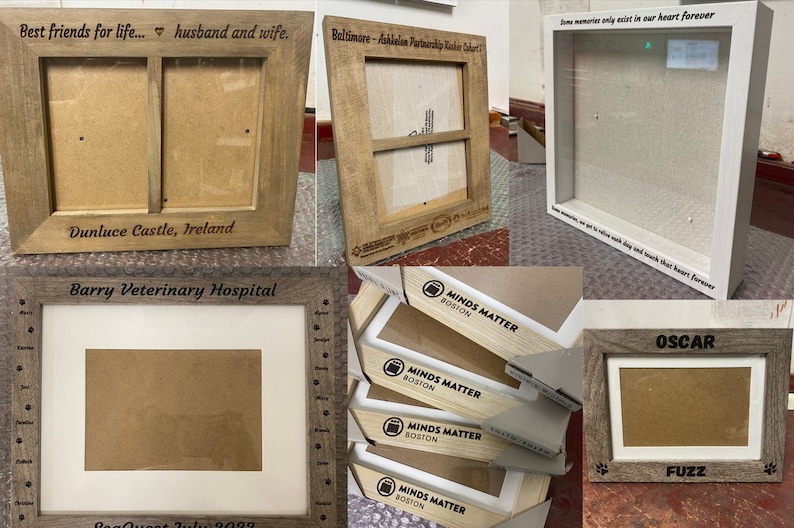 May include: Assortment of wooden picture frames with various engravings. Some frames are natural wood, others are painted white. The engravings include "Best friends for life... husband and wife", "Dunluce Castle, Ireland", "Barry Veterinary Hospital", "Baltimore-Fakkalon Partnership Kitchen Cohort", "Some memories only exist in our heart forever", "MINDS MATTER BOSTON", "OSCAR", and "FUZZ".