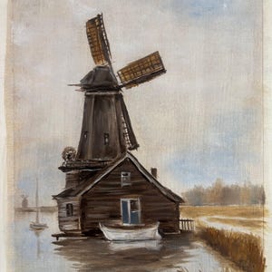 May include: An oil painting depicting a dark brown wooden windmill with rotating blades positioned next to a small white boat on a calm body of water. The scene includes a grassy bank, a distant sailboat, and a soft, muted sky in shades of blue and gray.