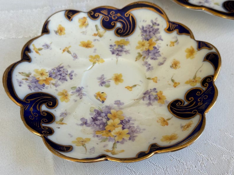 May include: A handmade, round wooden tray with a natural finish. The tray features a raised edge and two handles. The wood grain is visible, showcasing the tray's rustic charm. It is 40.6 cm in diameter.