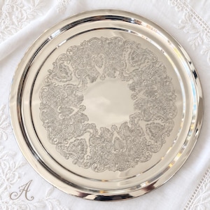 Vintage Silver-Plated Round Tray Collection – Ornate Etched Designs & Classic Makers – Sold Individually A. Heavy Tankard 10”