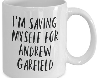 May include: White ceramic coffee mug with black text that reads "I'm saving myself for Andrew Garfield".