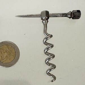 Antique, corkscrew, steel, nickel plated, peg and worm type for traveling