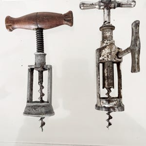 2 Antique German corkscrews, one with locking system and Louis Kummer with rack and pinion,