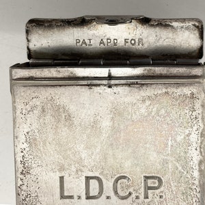 silver plated US patented match safe, vesta, marked PAT. APPL For and the initials of the owner, antique, vintage
