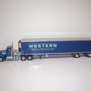 1/64 Kenworth W990 Day Cab With 53ft Utility Reefer Trailer - Western Distributing