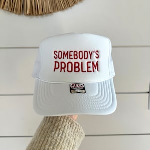 SOMEBODY&#39;S PROBLEM Trucker Hat | EMBROIDERED | White & Red | Embroidered Trucker Hat