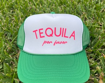 May include: A white and green trucker hat with the text "TEQUILA por favor" in pink lettering.